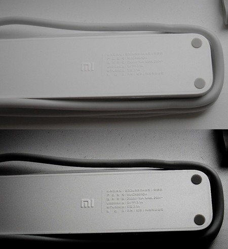 Оборотная сторона Xiaomi Mi Power Strip 3 Socket +3 USB Фиксирующие накладки на оборотной стороне Xiaomi Mi Power Strip 3 Socket +3 USB